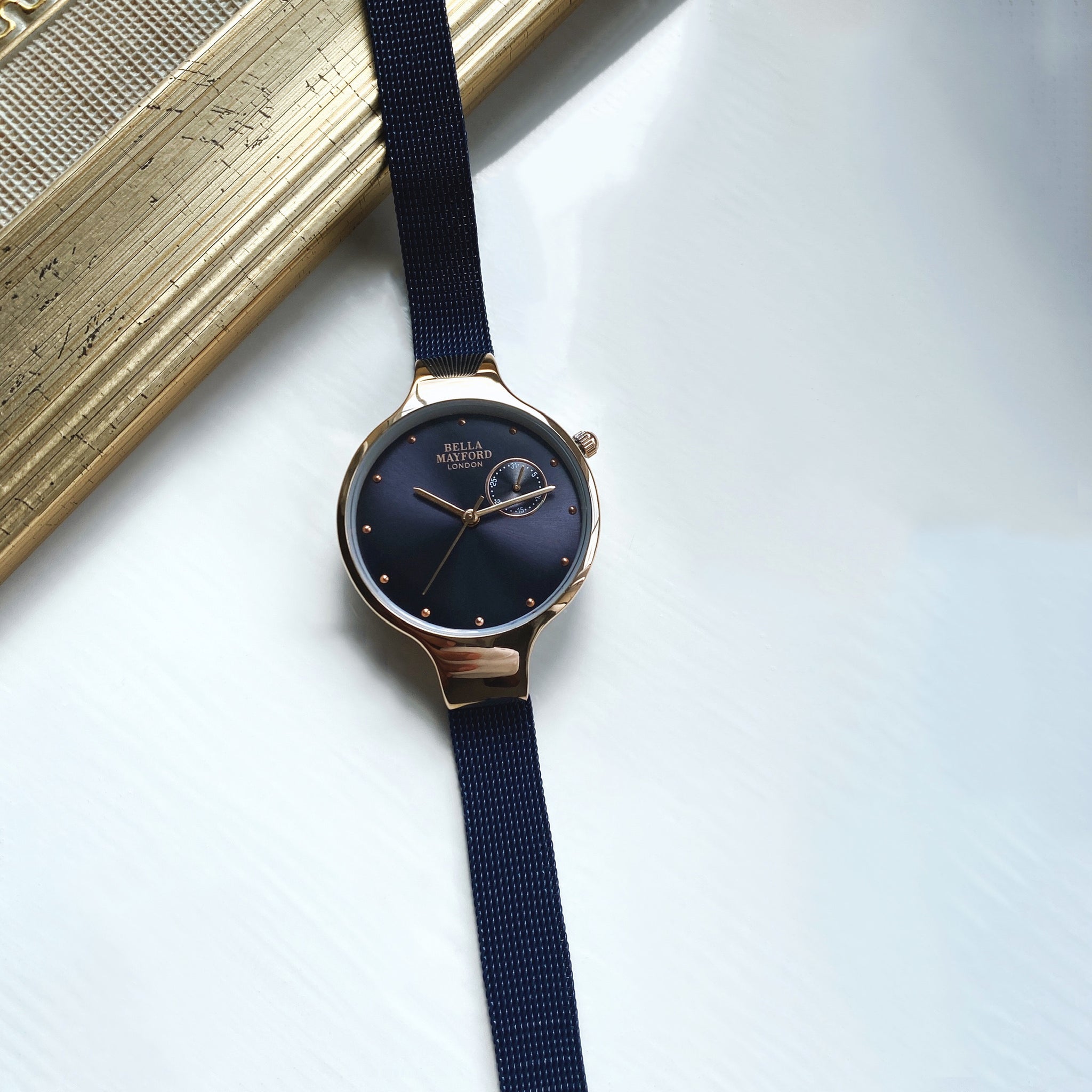 The Classic Chelsea. Rose Gold Dial, Blue Stainless Steel Strap
