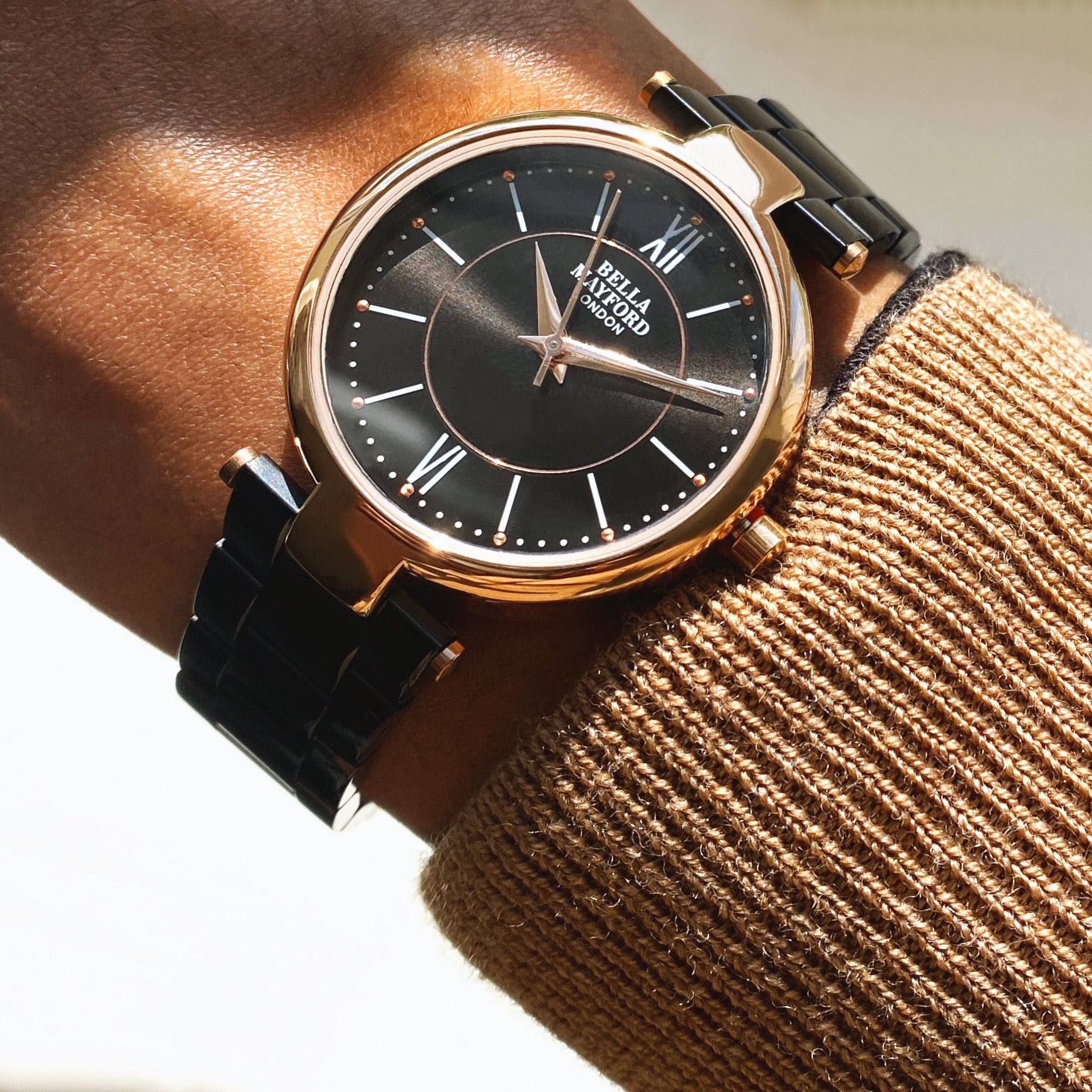 The Signature Solo. Rose Gold Dial And Black Strap