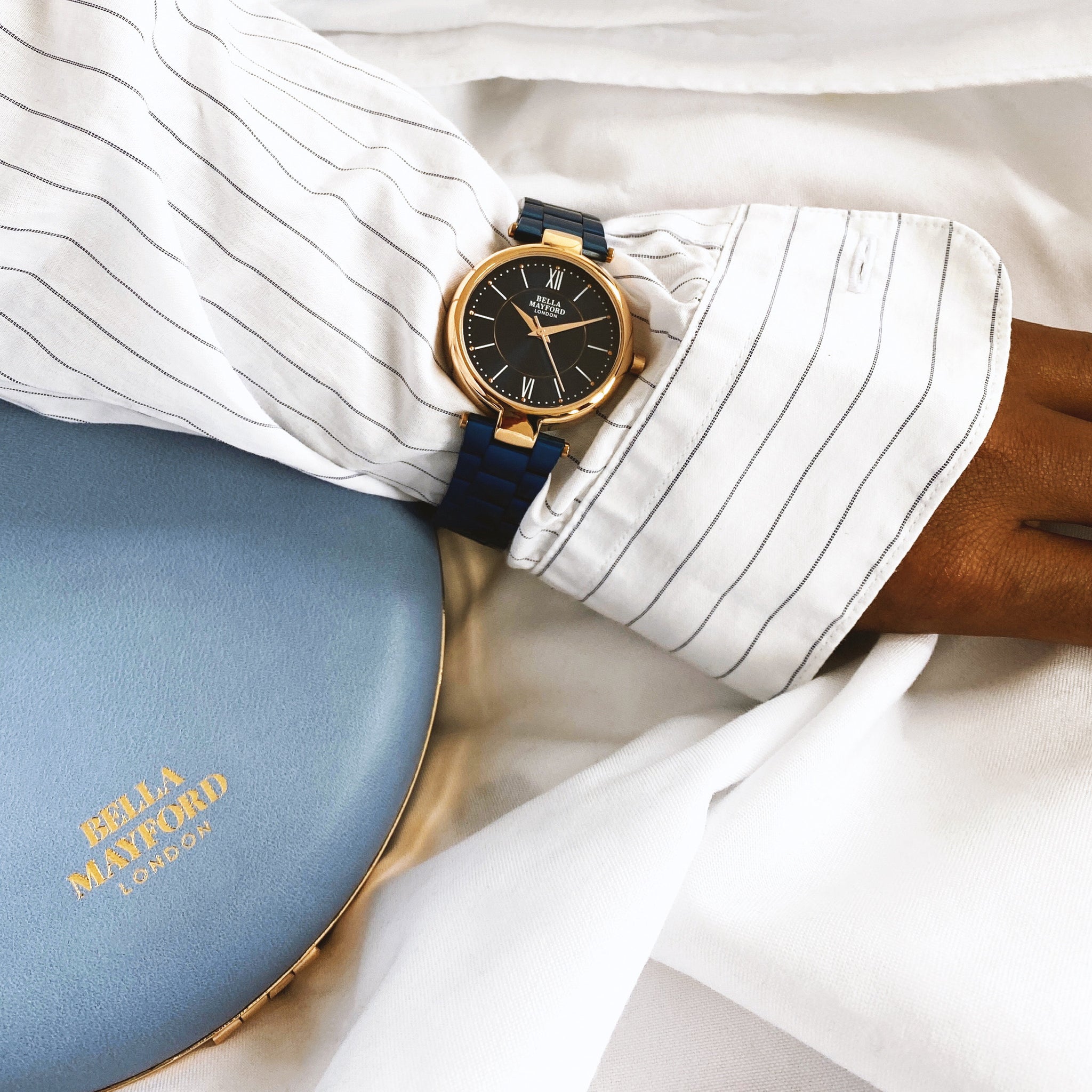 The Signature Solo. Rose Gold Dial And Blue Strap