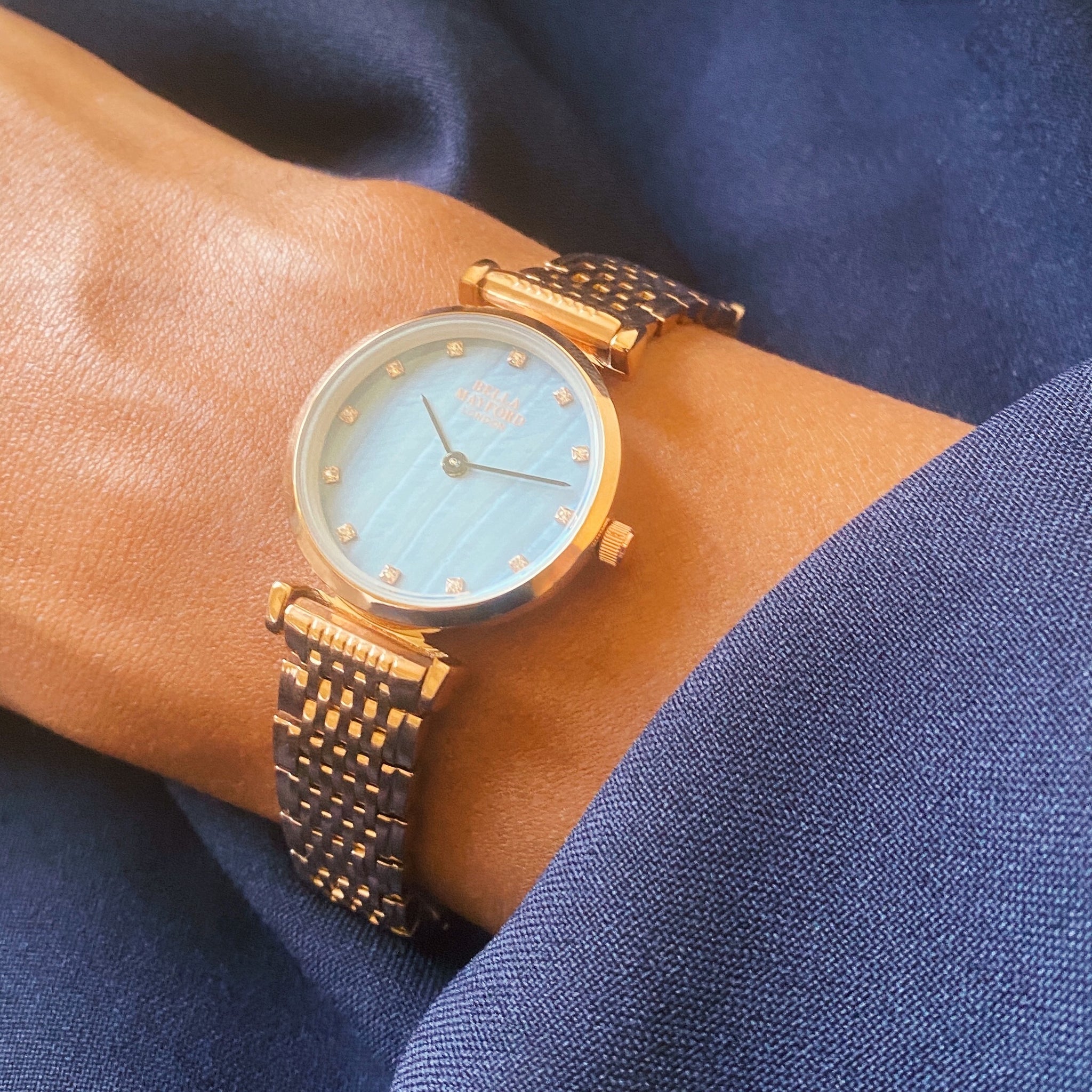 The Kensington. Rose Gold Stainless Steel Strap And Bezel And Blue Mother Of Pearl Dial