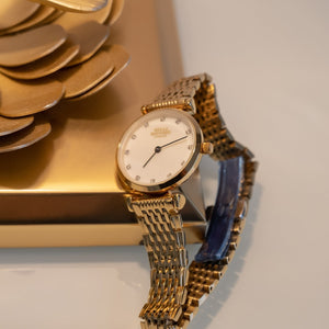 The Kensington. Gold Stainless Steel Strap and Bezel With Pearl Dial